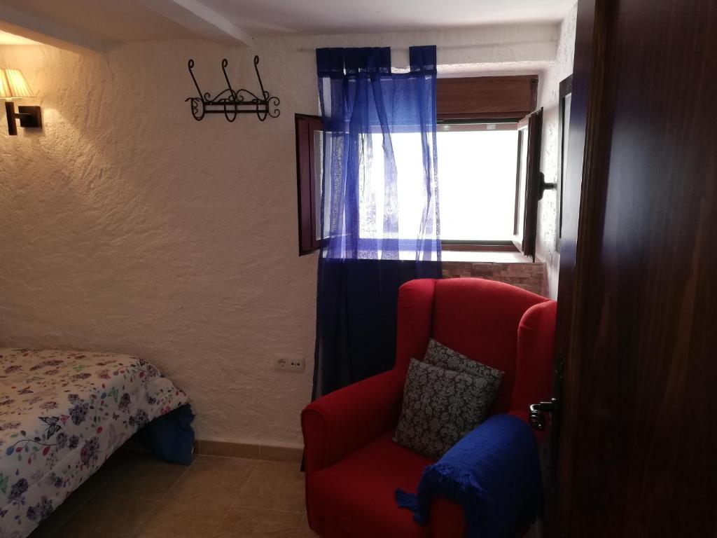 Postel nebo postele na pokoji v ubytování La casa de Tento