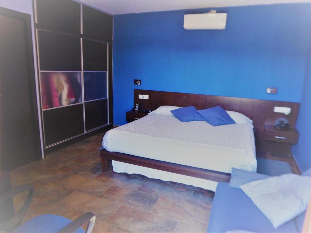 A bed or beds in a room at El Rincón de los Patos 1