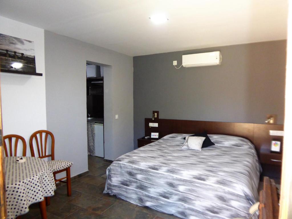 Postel nebo postele na pokoji v ubytování EL RINCON DE LOS PATOS 1