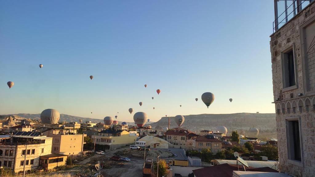 Nespecifikovaný výhled na destinaci Göreme nebo výhled na město při pohledu z hotelu