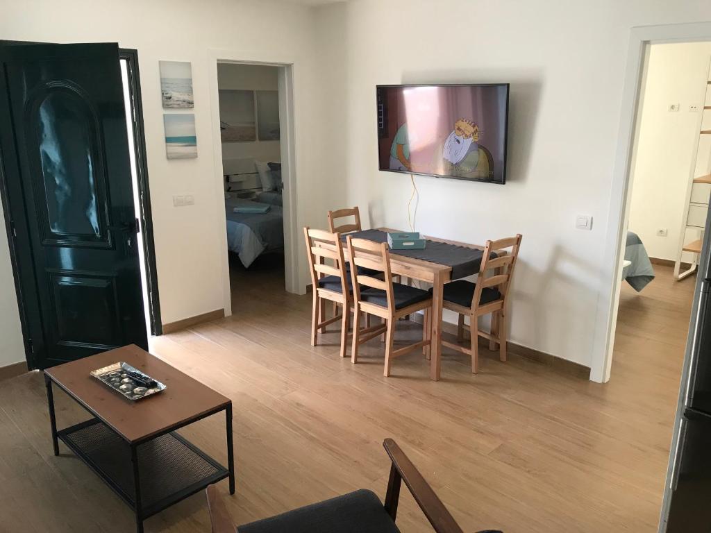 TV a/nebo společenská místnost v ubytování CASA BLANQUI