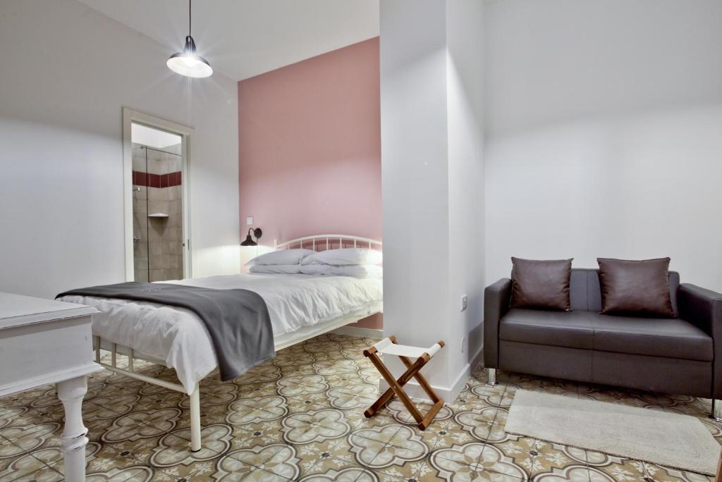 Postel nebo postele na pokoji v ubytování Chateau La Vallette - Tritoni Suite