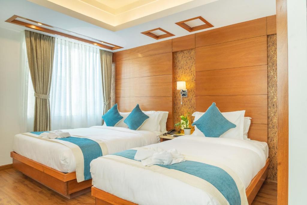Postel nebo postele na pokoji v ubytování Hotel Tradition & Spa