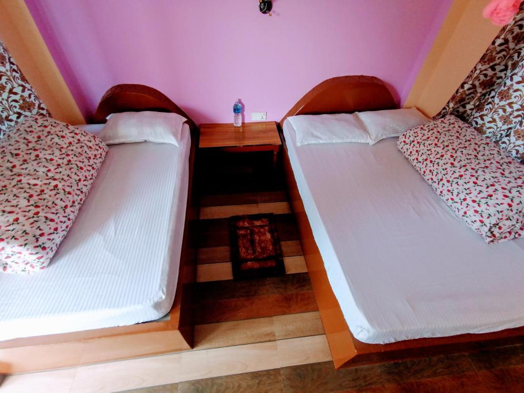 Postel nebo postele na pokoji v ubytování Hotel Garden of Dreams