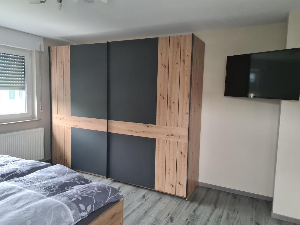 Postel nebo postele na pokoji v ubytování Pension Im Wiesengrund Steinau Marborn