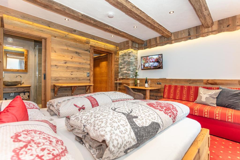 TV a/nebo společenská místnost v ubytování Pension Berghof