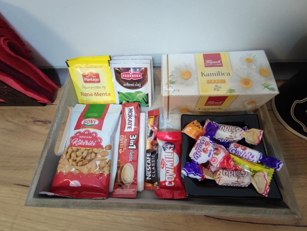 a cooler filled with different types of food and snacks at Passion by Nights & Smiles in Tuzla