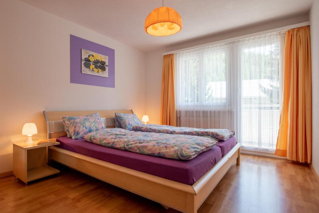 Postel nebo postele na pokoji v ubytování Haus Aurora