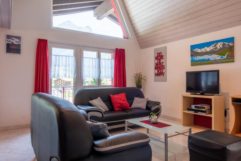 TV a/nebo společenská místnost v ubytování Haus Aurora