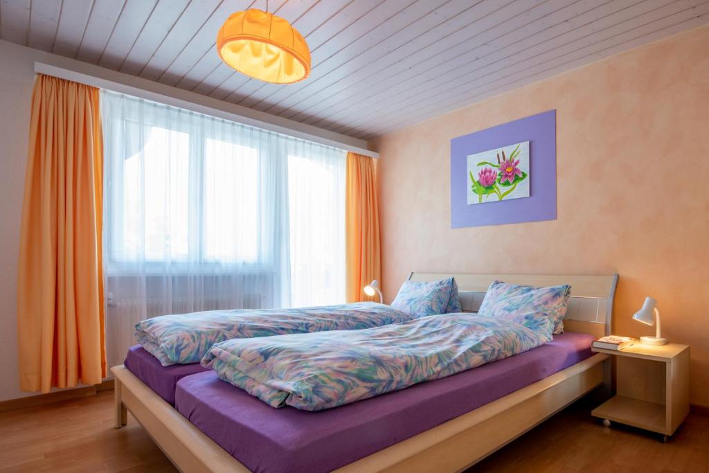 Postel nebo postele na pokoji v ubytování Haus Aurora