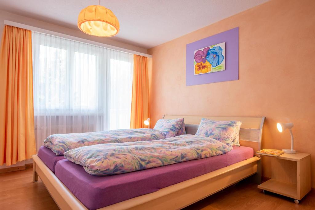 Postel nebo postele na pokoji v ubytování Haus Aurora