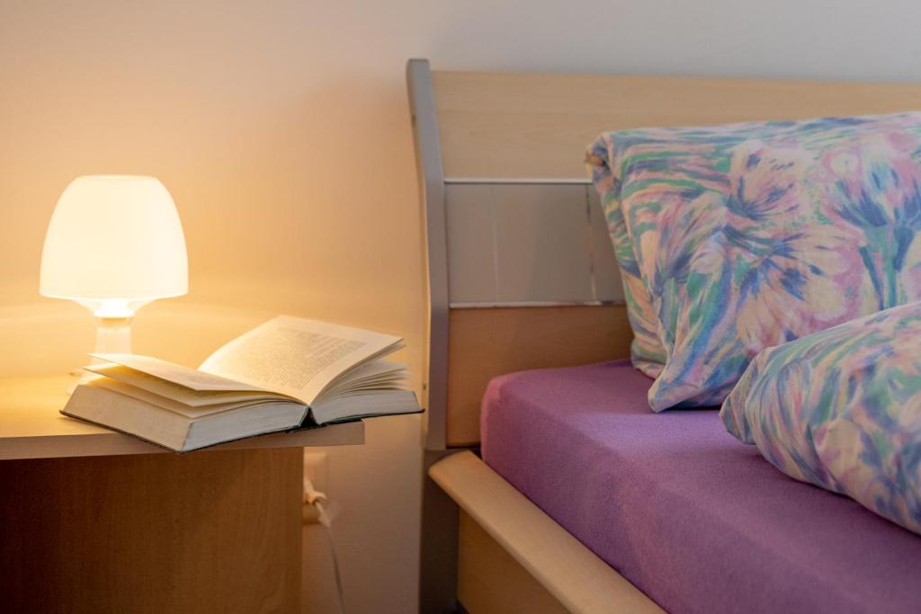Postel nebo postele na pokoji v ubytování Haus Aurora