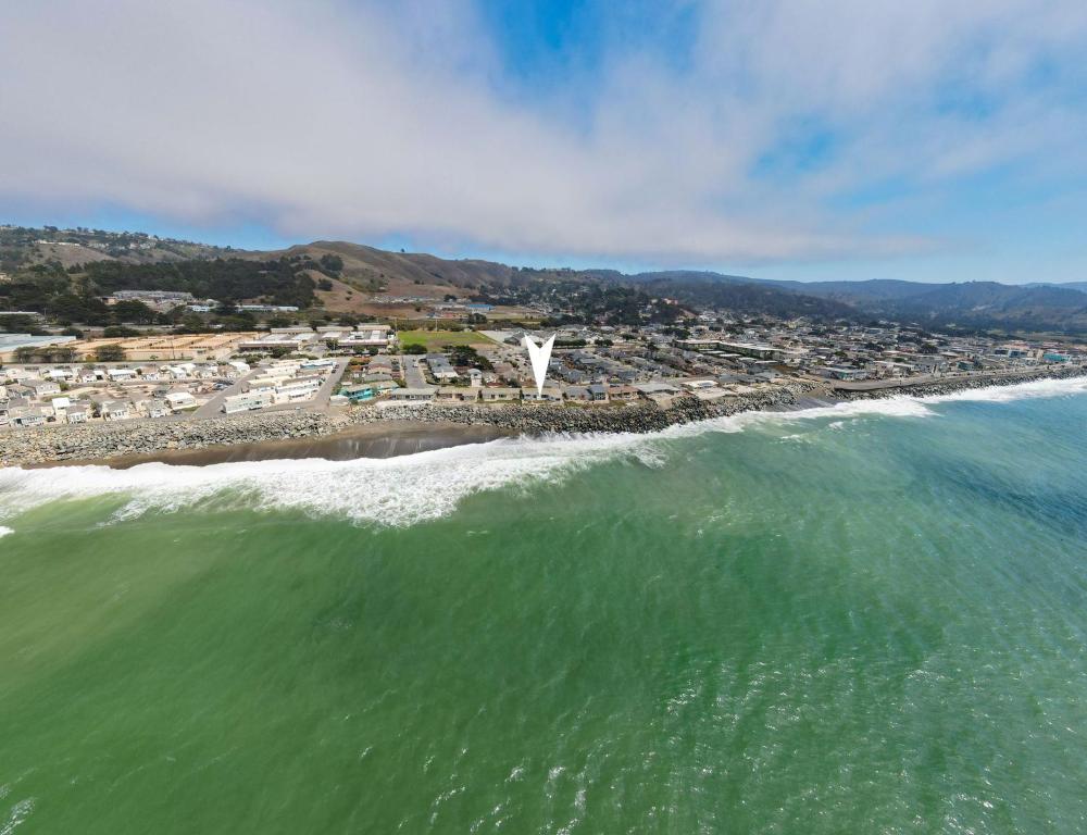 an aerial view of a beach and the ocean at @ Marbella Lane - Oceanfront w/ unobstructed views!! in Pacifica