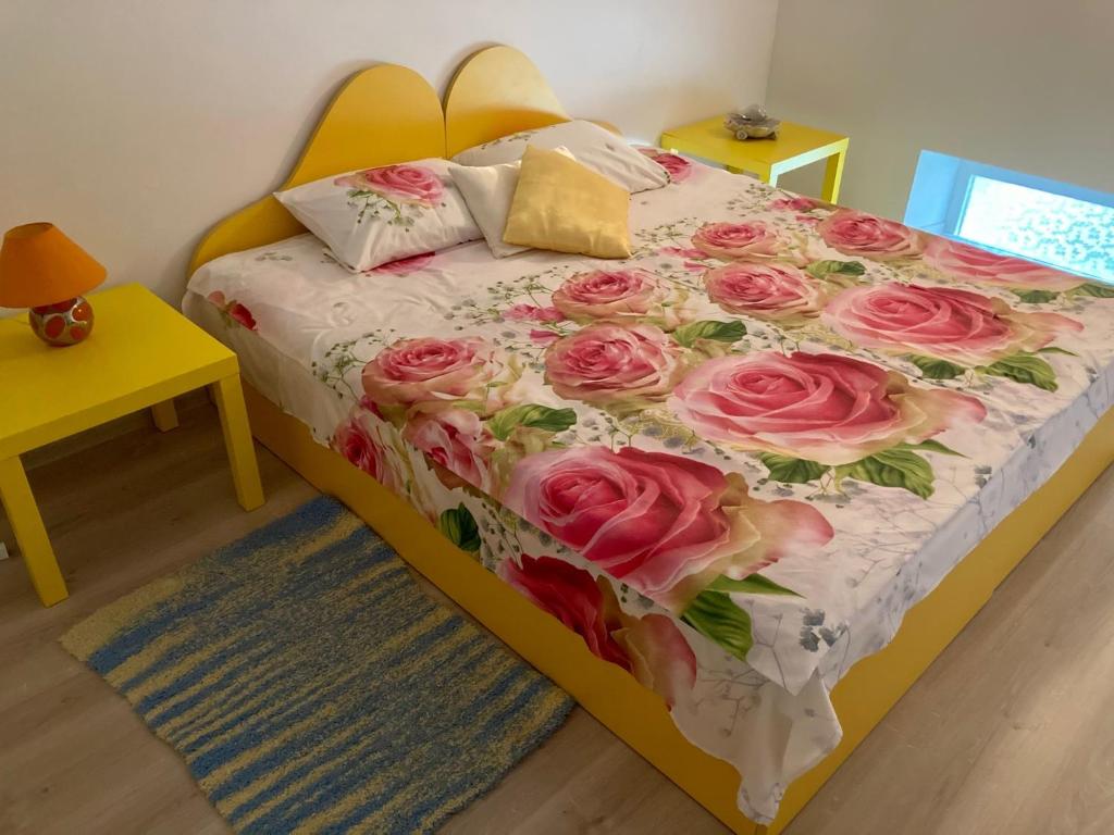 Postel nebo postele na pokoji v ubytování Apartment Bombonyerka