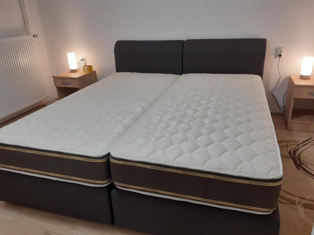Postel nebo postele na pokoji v ubytování Apartman Nena