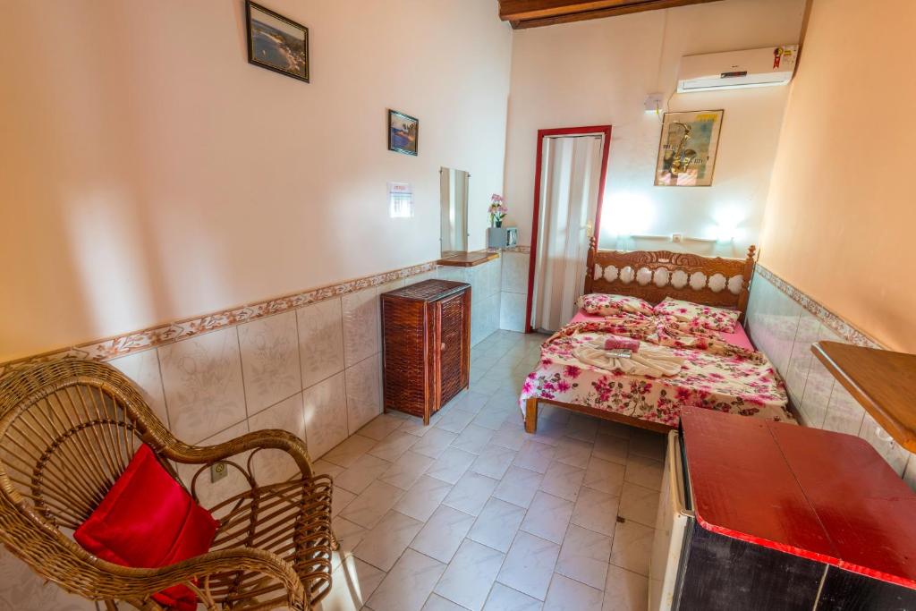 Voodi või voodid majutusasutuse Papagaio Hostel & Pousada toas