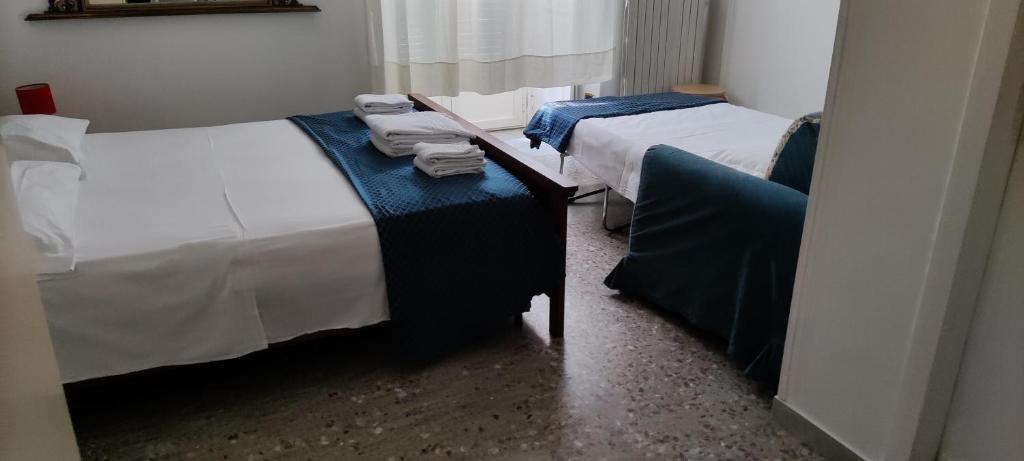 Posteľ alebo postele v izbe v ubytovaní Nigna B&b