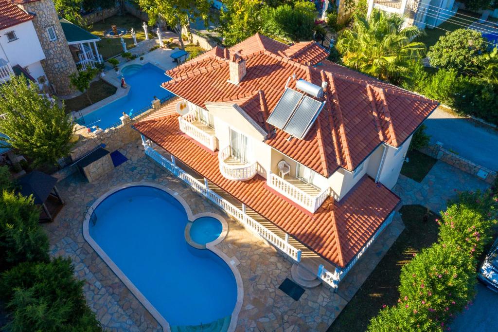 an aerial view of a house with a swimming pool at Villa Etki in Ortaca
