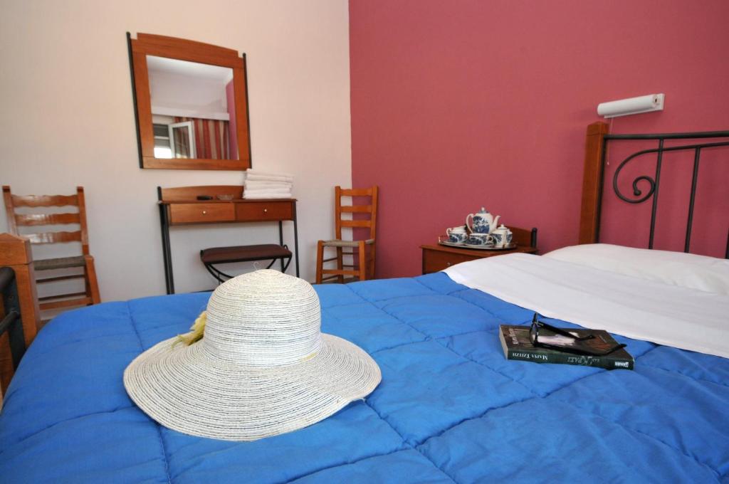 Postel nebo postele na pokoji v ubytování Hotel Galaxy