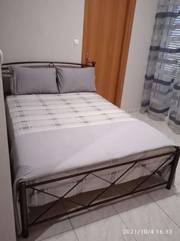 Ένα ή περισσότερα κρεβάτια σε δωμάτιο στο Apartment ARION 2
