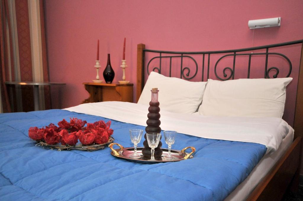 Postel nebo postele na pokoji v ubytování Hotel Galaxy