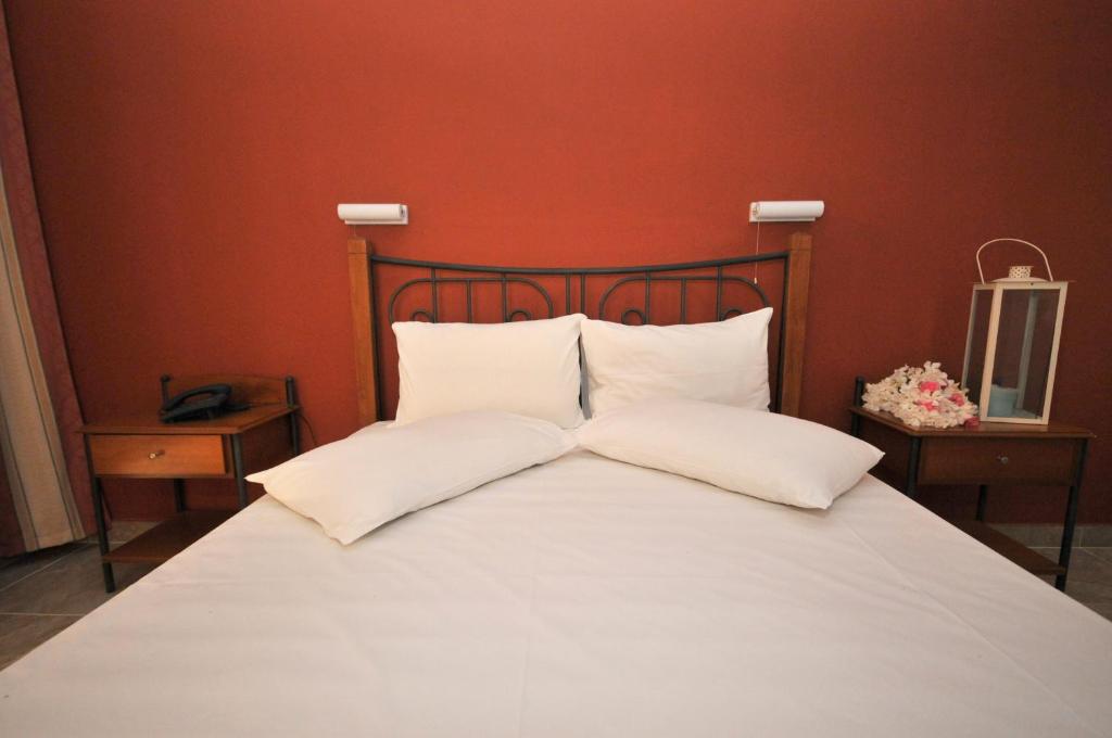 Postel nebo postele na pokoji v ubytování Hotel Galaxy