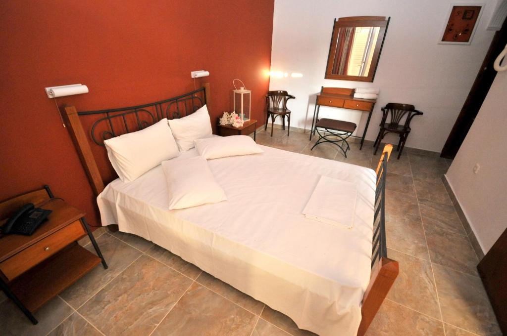 Postel nebo postele na pokoji v ubytování Hotel Galaxy
