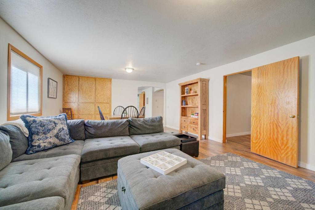 a living room with a couch and a table at Middle floor, 3 bedroom apt, 4 blocks from downtown in Bozeman