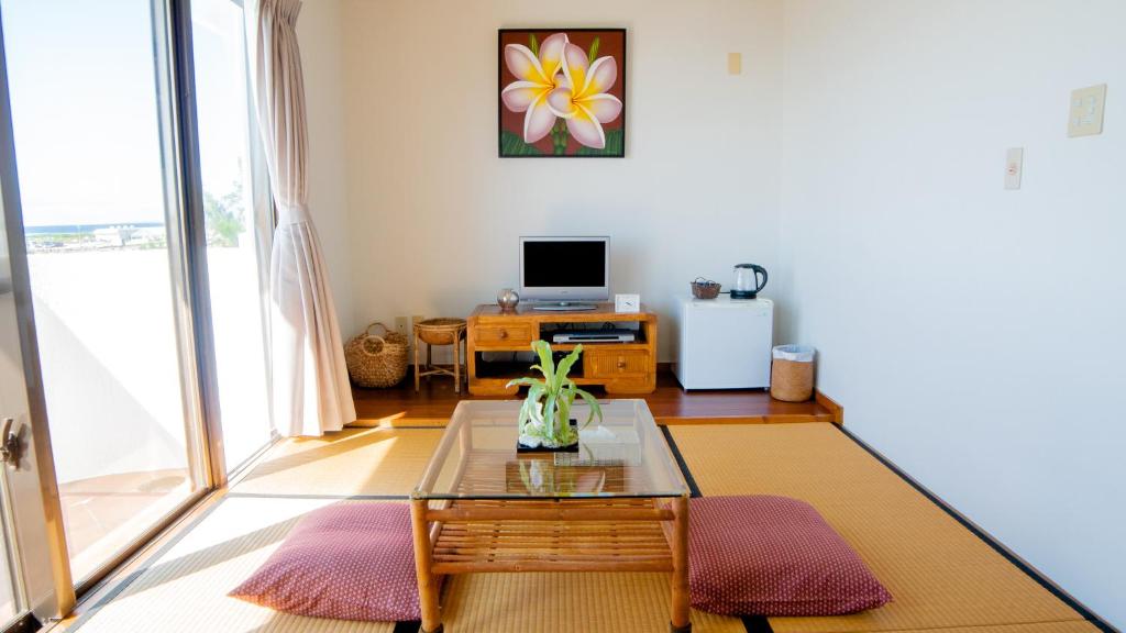 TV a/nebo společenská místnost v ubytování Sunset Beach House