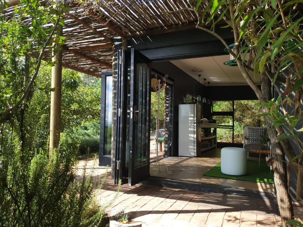 an open entryway to a house with a patio at The Studio @ Mount View Lodge in Sedgefield