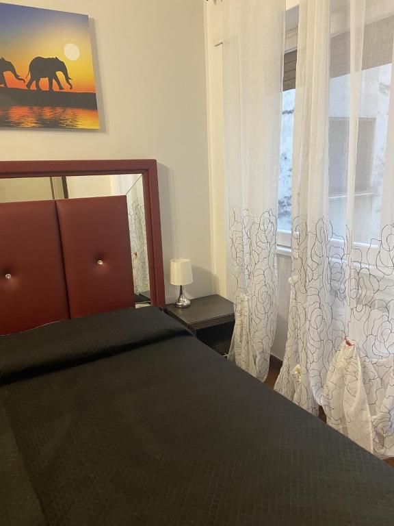Łóżko lub łóżka w pokoju w obiekcie Bed and Breakfast Impruneta28