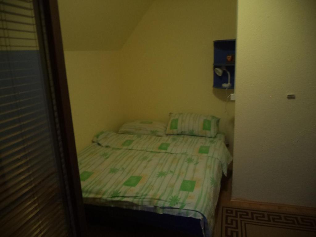 Postel nebo postele na pokoji v ubytování Apartments Zekovic