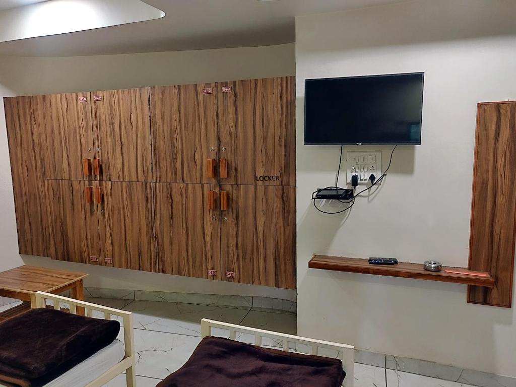 TV a/nebo společenská místnost v ubytování Hotel Milan