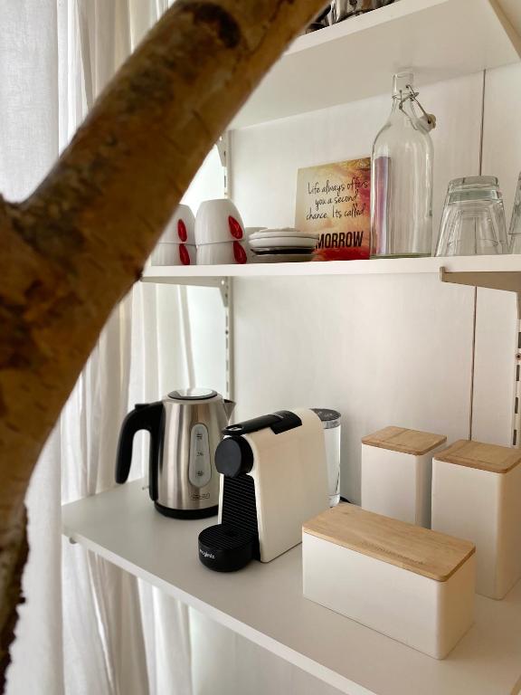Příslušenství pro přípravu čaje a kávy v ubytování Casa De Palmas - Tiny house