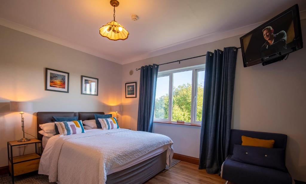 Postel nebo postele na pokoji v ubytování Bunratty Meadows Bed & Breakfast