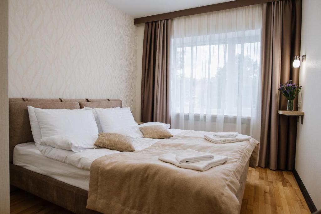 Postel nebo postele na pokoji v ubytování ОРАНТА