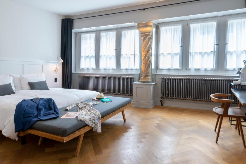 Postel nebo postele na pokoji v ubytování Marktgasse Hotel