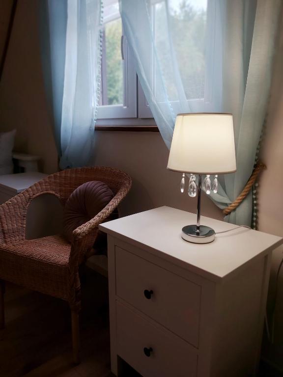 Posezení v ubytování Osada wspomnień