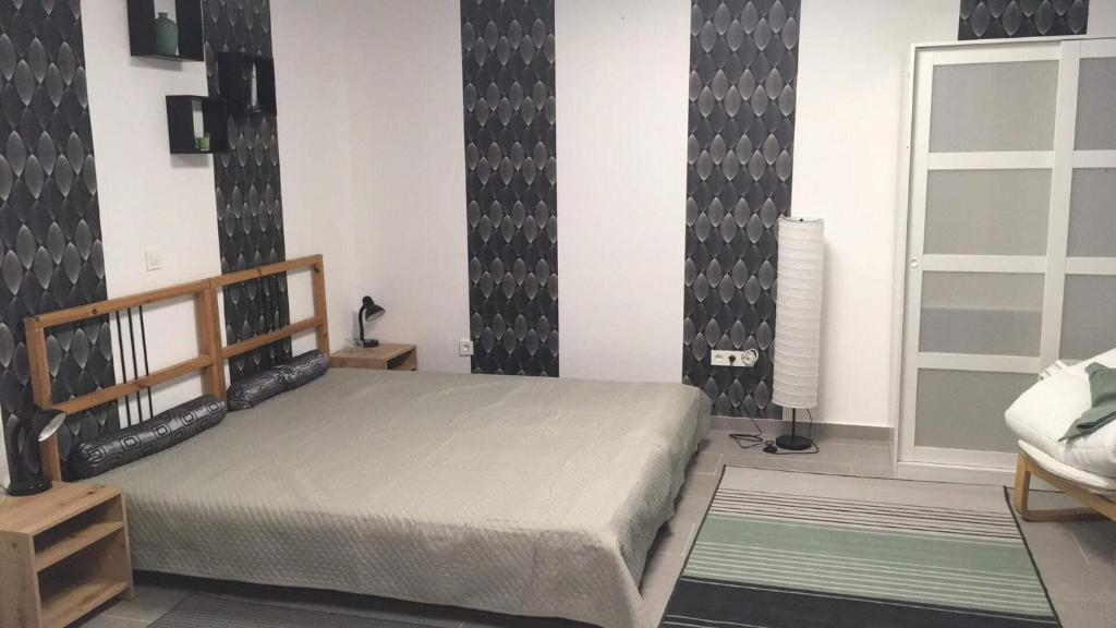 Posteľ alebo postele v izbe v ubytovaní Cuki Apartmanok