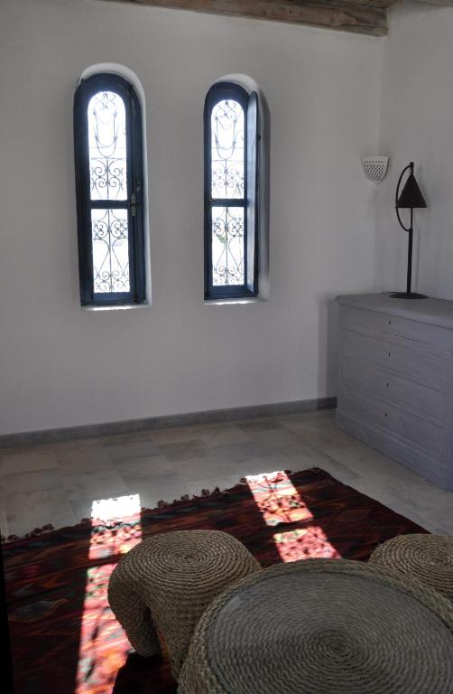 Postel nebo postele na pokoji v ubytování Dar Ennour Djerbahood Erriadh