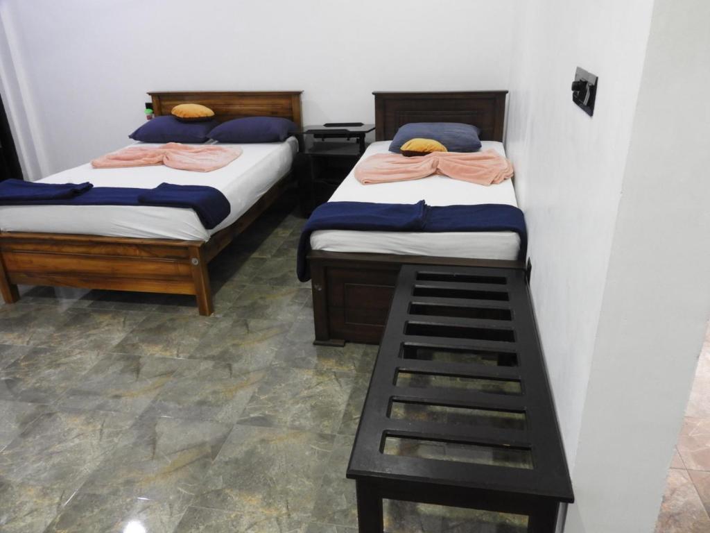 Postel nebo postele na pokoji v ubytování Iwamisou