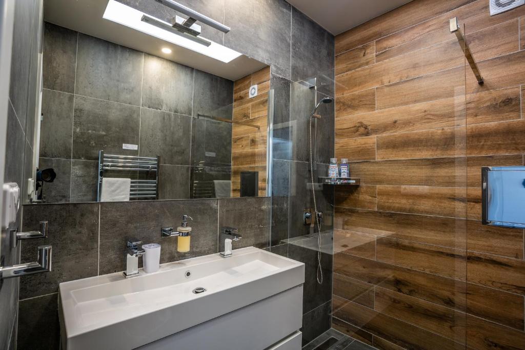 Koupelna v ubytování SCANDIC Apartments Plešivec