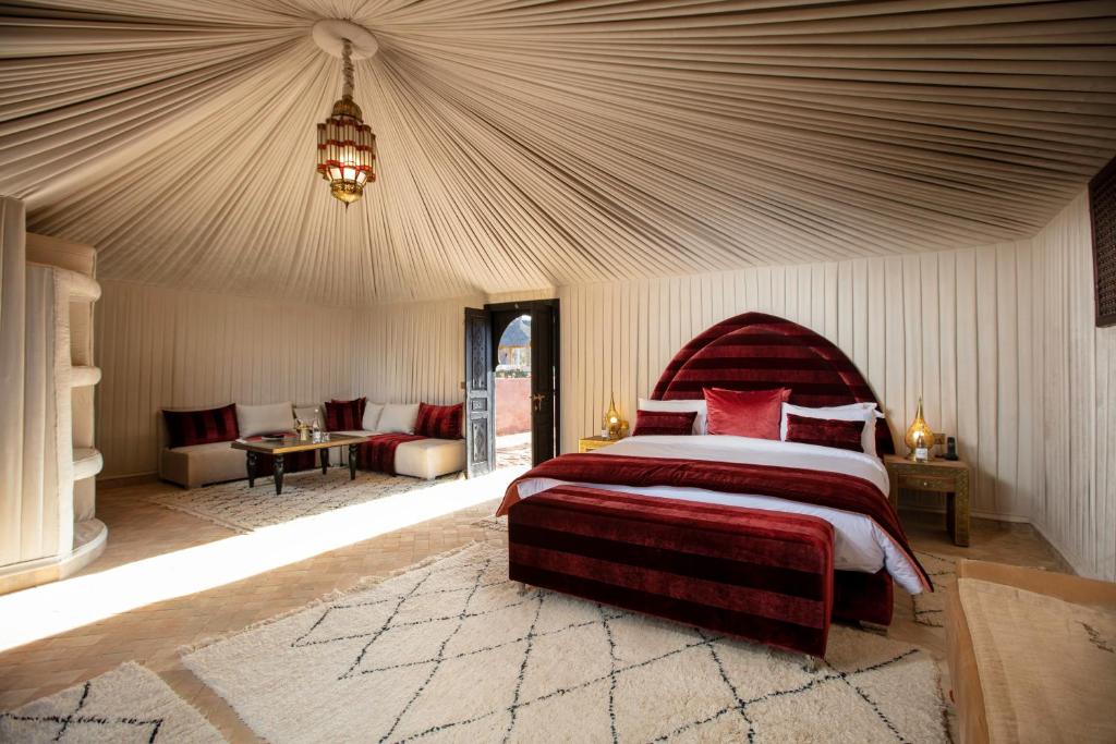 Postel nebo postele na pokoji v ubytování Kalyptus Luxury Camp