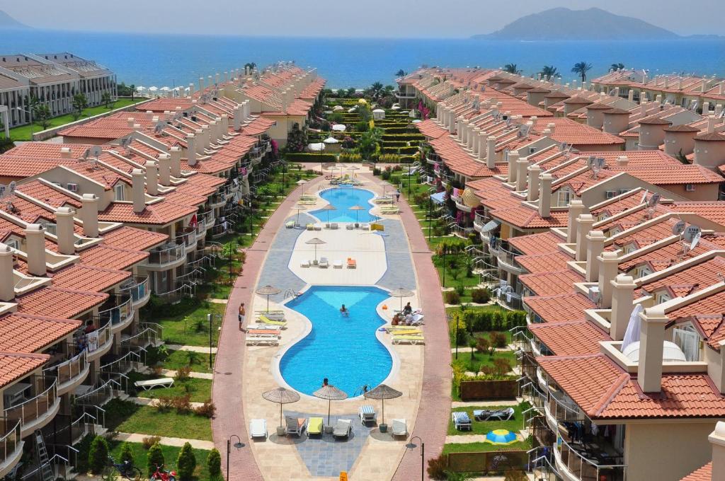 an aerial view of the pool at the resort at SUNSET BEACH CLUb in Fethiye