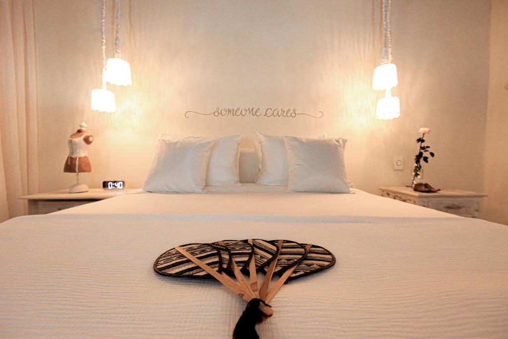 Postel nebo postele na pokoji v ubytování Casa Diluca Cartagena Hotel Boutique