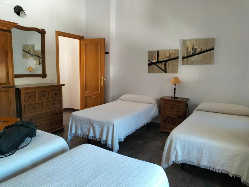 Posteľ alebo postele v izbe v ubytovaní Casas Rurales Los Montes