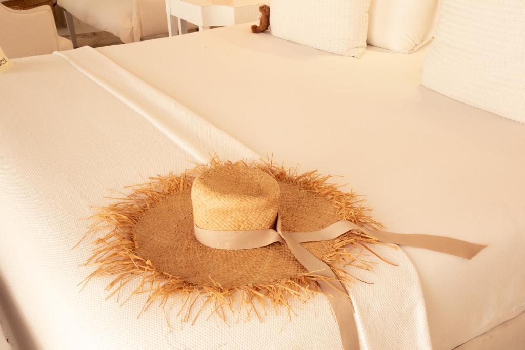 Postel nebo postele na pokoji v ubytování Casa Diluca Cartagena Hotel Boutique