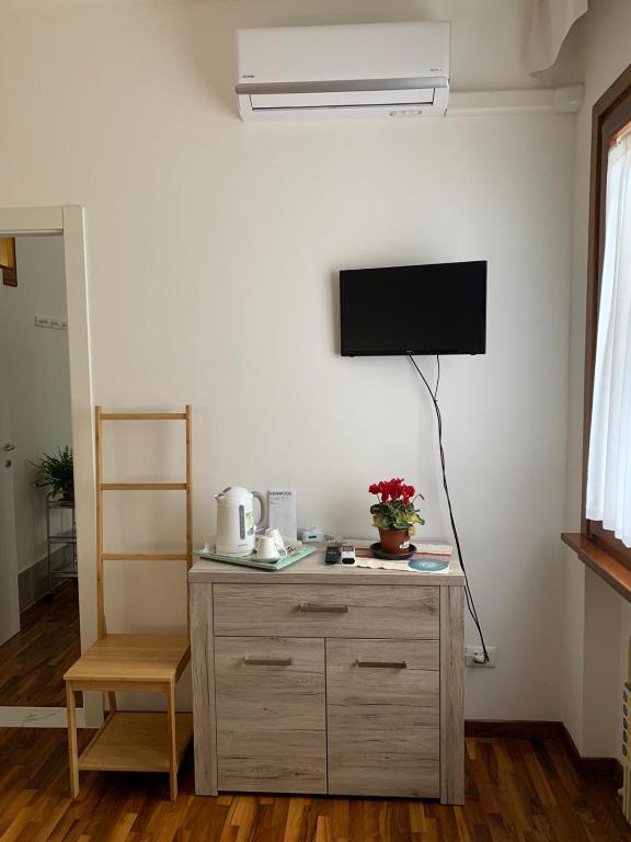 TV a/nebo společenská místnost v ubytování B & B Chic