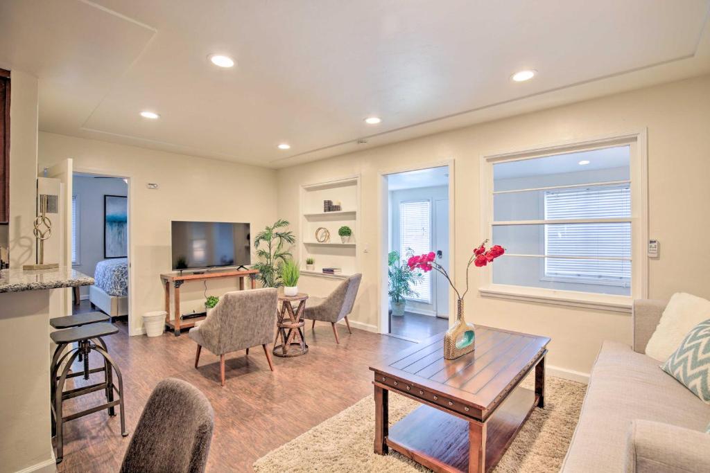 a living room with a couch and a table at Updated Chula Vista Townhome - WFH Friendly! in Chula Vista