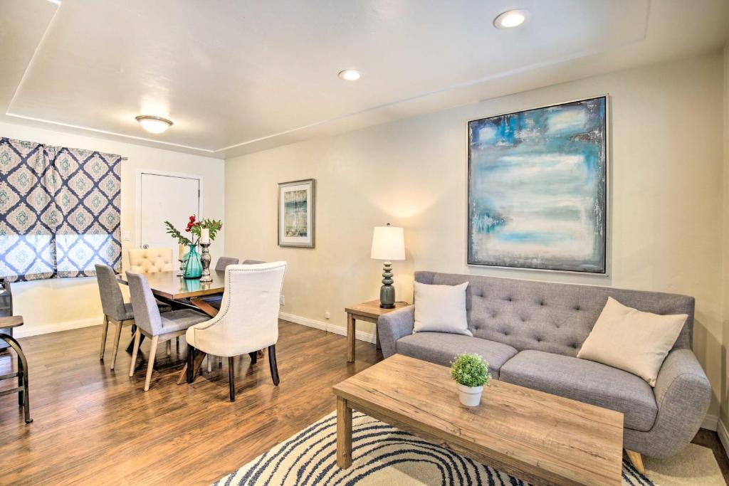 a living room with a couch and a table at Chula Vista Retreat Near Third Avenue Village in Chula Vista
